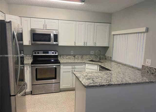 Property at 4513 Treehouse Ln Unit 11C, Tamarac, FL 33319, 2 beds, 1 bath