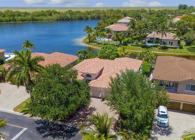 Property at 12307 NW 49th St, Coral Springs, FL 33076, 5 beds, 3 baths
