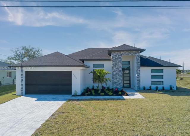 Property at 2312 NE Juanita Pl, Cape Coral, FL 33909, 4 beds, 2 baths