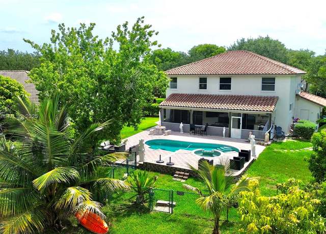 Property at 1560 NW 103rd Ter, Coral Springs, FL 33071, 5 beds, 3.5 baths