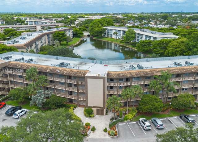 Property at 1704 Andros Isle Unit E1, Coconut Creek, FL 33066, 2 beds, 2 baths