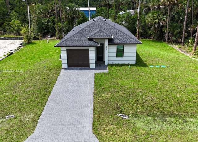 Property at 505 W 10th St, Lehigh Acres, FL 33972, 3 beds, 2 baths