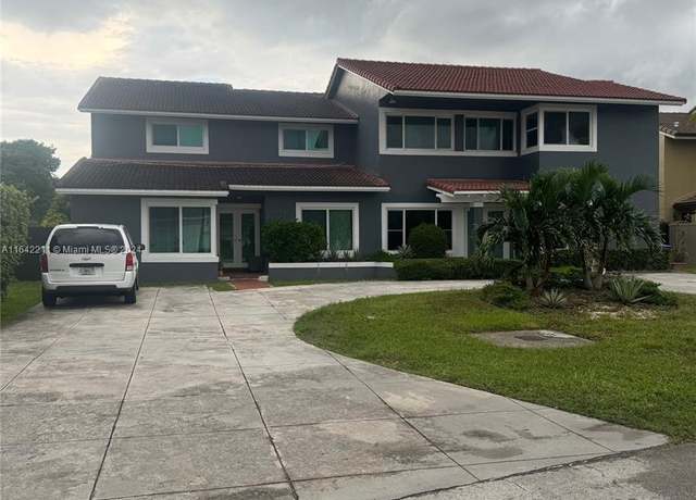 Property at 20042 W Lake Dr, Hialeah, FL 33015, 4 beds, 3 baths
