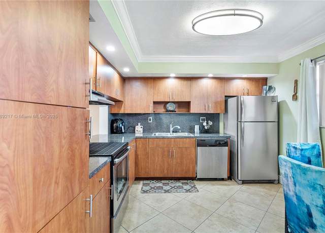 Property at 4930 E Sabal Palm Blvd #312, Tamarac, FL 33319, 2 beds, 2 baths