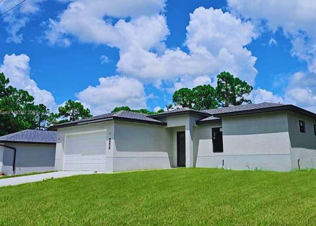 Property at 2713 56th St W, Lehigh Acres, FL 33971, 3 beds, 2 baths