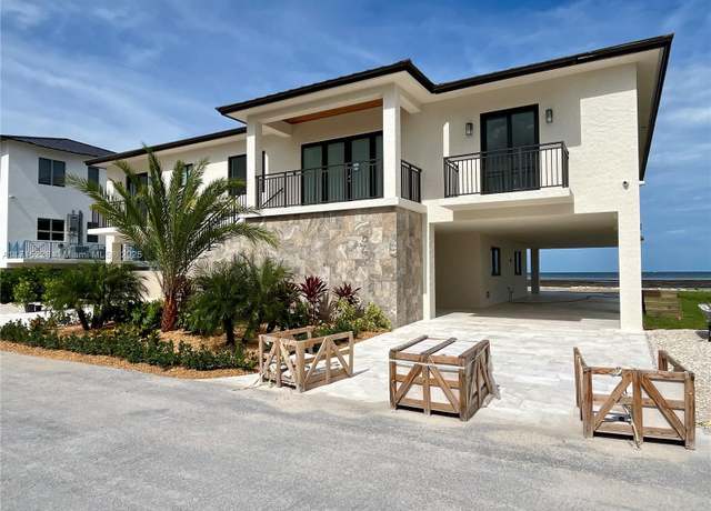 Property at 126 SE Sunrise Dr, Marathon, FL 33050, 5 beds, 4 baths