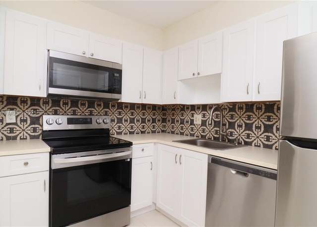 Property at 2061 NW 47th Ter #114, Lauderhill, FL 33313, 1 bed, 1.5 baths