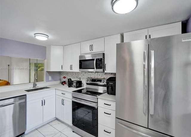 Property at 6075 N Sabal Palm Blvd #212, Tamarac, FL 33319, 2 beds, 2 baths