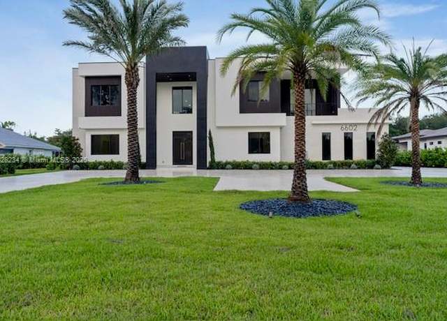 Property at 6602 NW 62th Ter, Parkland, FL 33067, 6 beds, 8.5 baths