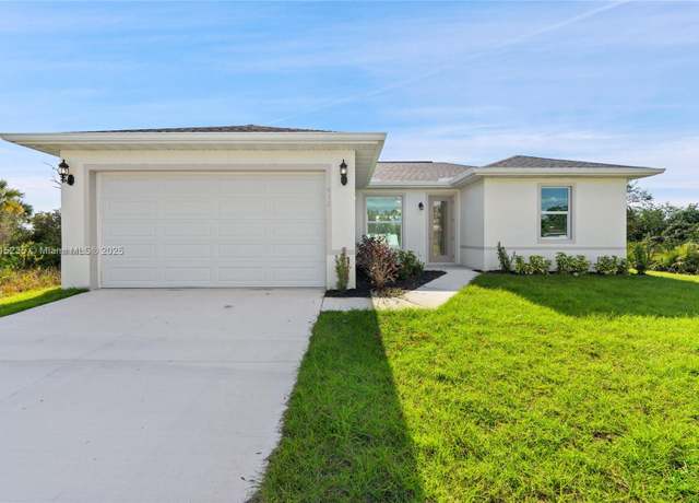 Property at 957 Commodore St, Lehigh Acres, FL 33974, 3 beds, 2 baths