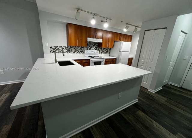 Property at 5900 W Sample Rd #303, Coral Springs, FL 33067, 3 beds, 2 baths
