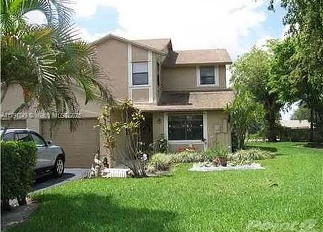 Property at 256 Lakeside Cir, Sunrise, FL 33326, 3 beds, 2 baths