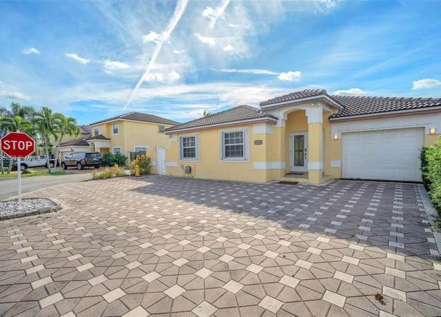 Property at 8300 NW 201st St, Hialeah, FL 33015, 4 beds, 2 baths