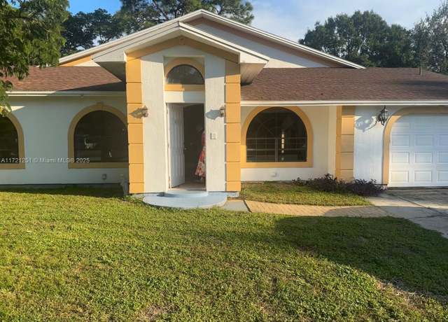 Property at 413 NE Tewksbury Ln, Palm Bay, FL 32907, 4 beds, 2 baths