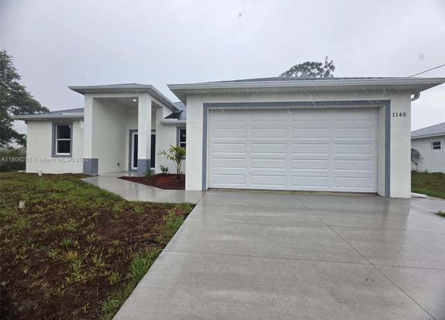 Property at 1145 SW Antonio St E, Lehigh Acres, FL, 3 beds, 2 baths