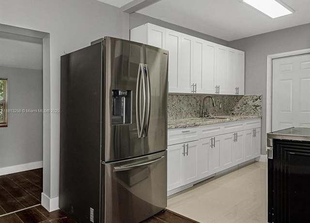 Property at 1334 NW 56th St, Miami, FL 33142, 4 beds, 3 baths
