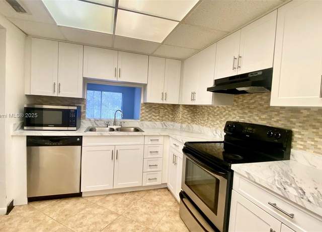 Property at 1200 NW 87th Ave #410, Coral Springs, FL 33071, 2 beds, 2 baths