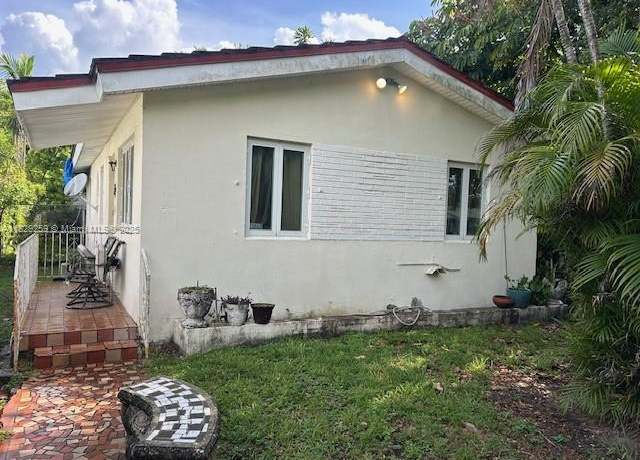 Property at 1985 NW 57th St, Miami, FL 33142, 4 beds, 2 baths