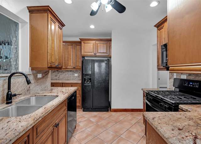 Property at 1024 Tyler St, Hollywood, FL 33019, 5 beds, 3 baths