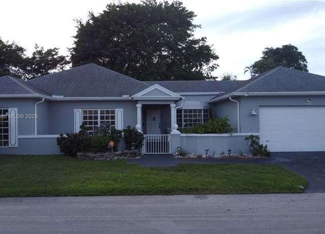 Property at 4511 Queen Palm Ln, Tamarac, FL 33319, 3 beds, 2 baths