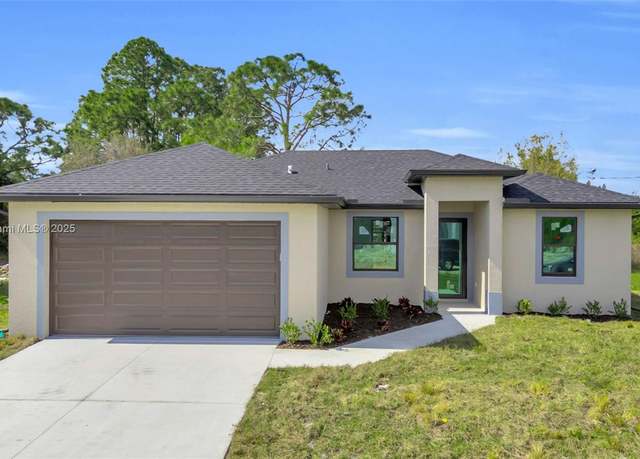 Property at 2503 41 St SW, Lehigh Acres, FL 33976, 3 beds, 2 baths