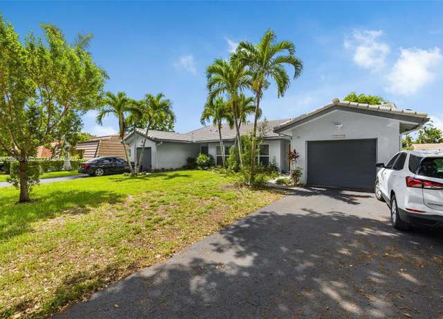 Property at 10650 NW 45th St, Coral Springs, FL 33065, 3 beds, 2 baths