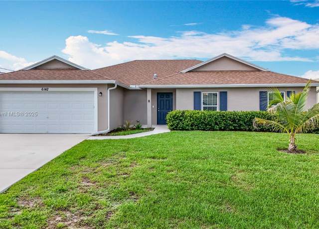 Property at 6142 NW Hopkins Ave, Port St Lucie, FL 34986, 4 beds, 3 baths