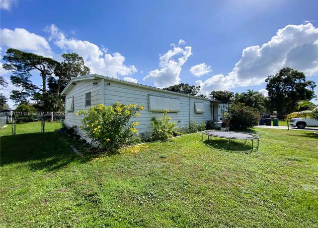 Property at 714 NE 29 Ave, FL 34972, 5 beds, 3 baths