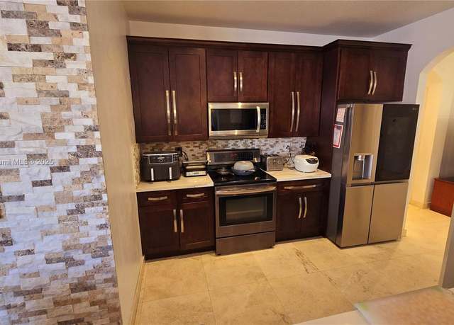 Property at 2105 NE 40th Ave, Homestead, FL 33033, 3 beds, 2.5 baths