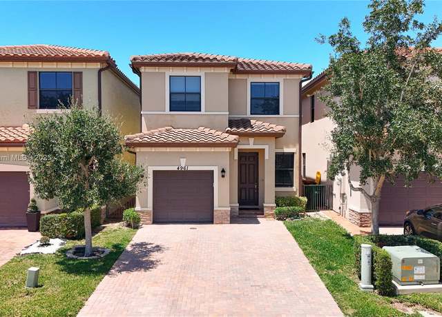 Property at 4961 NW 59th St, Tamarac, FL 33319, 3 beds, 2.5 baths