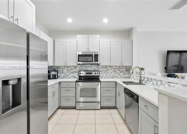 Property at 2979 NW 30th Pl, Oakland Park, FL 33311, 2 beds, 2.5 baths