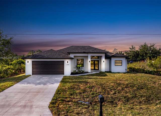Property at 2709 58th St W, Lehigh Acres, FL 33971, 4 beds, 2.5 baths