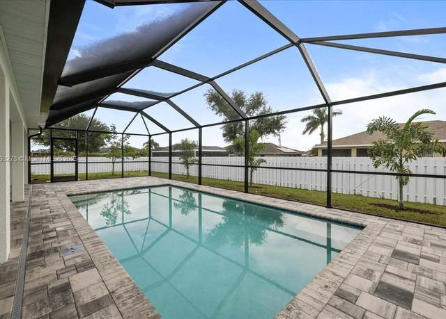 Property at 634 NW 15th Ter, Cape Coral, FL 33993, 4 beds, 3 baths