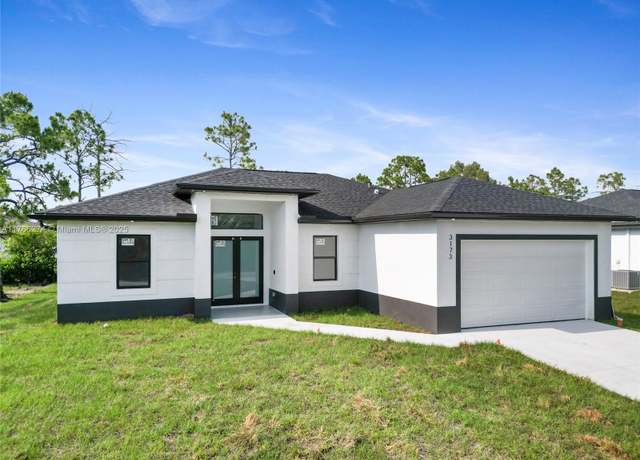 Property at 3173 Sunshine Blvd N, Lehigh Acres, FL 33971, 3 beds, 2 baths