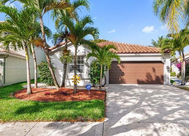 Property at 1210 Oakwater Dr, Royal Palm Beach, FL 33411, 4 beds, 2 baths