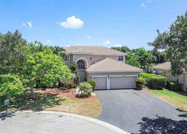Property at 10922 NW 49th Dr, Coral Springs, FL 33076, 5 beds, 3 baths