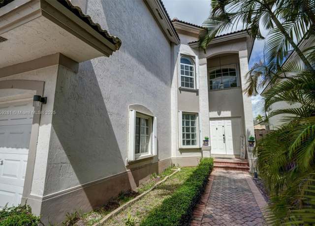 Property at 10773 NW 69th Ter, Doral, FL 33178, 5 beds, 3 baths