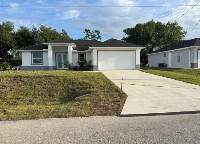 Property at 2902 49th St SW, Lehigh Acres, FL 33976, 3 beds, 2 baths