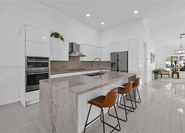 Property at 710 Lake Blvd, Weston, FL 33326, 4 beds, 3.5 baths