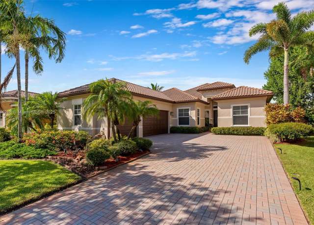 Property at 11425 NW 75th Mnr, Parkland, FL 33076, 5 beds, 3 baths