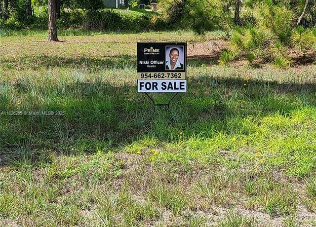 Property at 653 Jaguar Blvd, Lehigh Acres, FL 33974