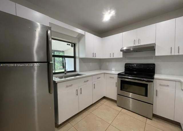 Property at 6141 Wiley St, Hollywood, FL 33023, 3 beds, 2 baths