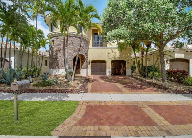Property at 7086 Spyglass Ave, Parkland, FL 33076, 6 beds, 3.5 baths
