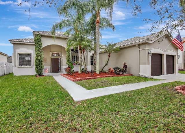 Property at 856 Heritage Dr, Weston, FL 33326, 4 beds, 2 baths