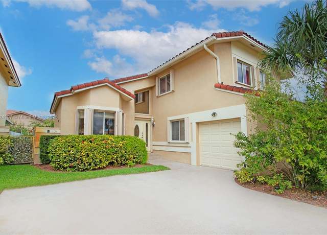 Property at 18318 NW 61st Ct, Hialeah, FL 33015, 4 beds, 3 baths