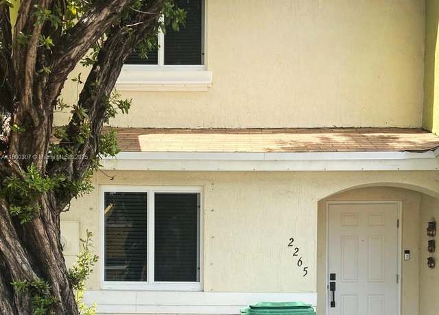 Property at 2265 NW 136th Ter, Opa Locka, FL 33054, 3 beds, 2.5 baths