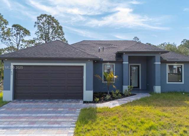 Property at 509 Cottonwood Ave S, Lehigh Acres, FL 33974, 3 beds, 2 baths