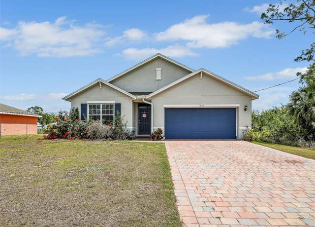 Property at 1036 Alaska Ave, Lehigh Acres, FL 33971, 4 beds, 2 baths