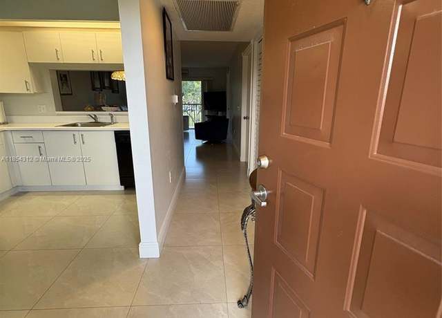 Property at 12955 SW 16th Ct Unit 205M, Pembroke Pines, FL 33027, 2 beds, 1.5 baths
