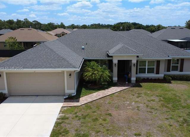 Property at 1948 Redmont Ave, Lehigh Acres, FL 33972, 4 beds, 2 baths